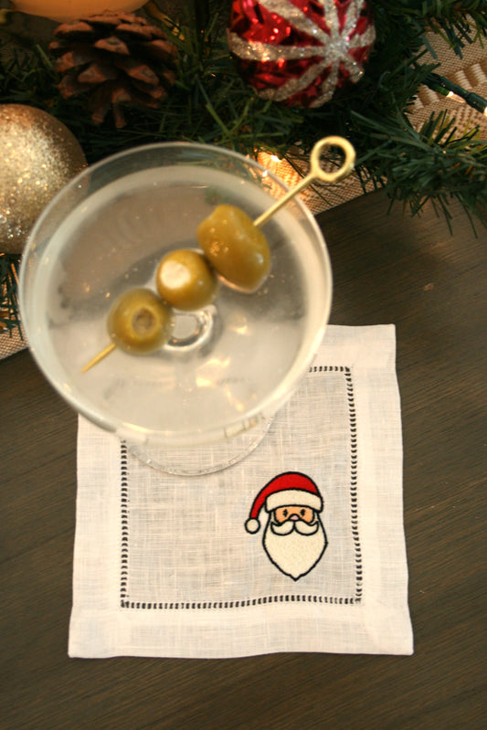 embroidered cocktail napkin with Santa face