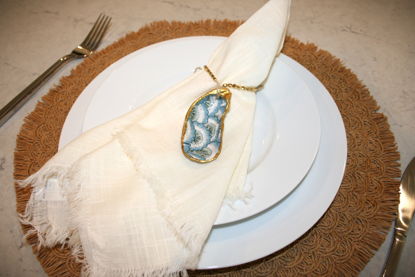 oyster charm as a napkin ring