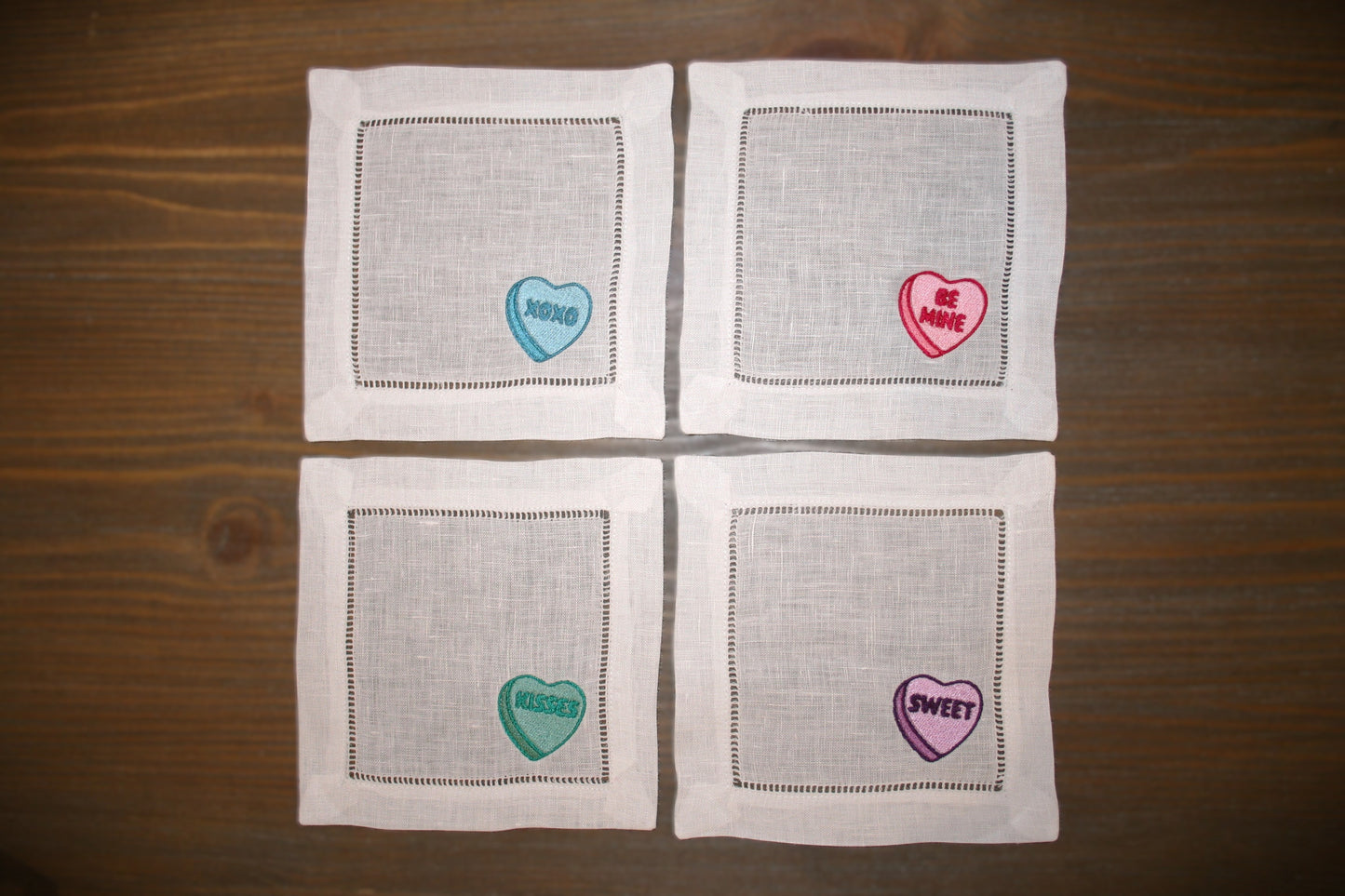 Embroidered cocktail napkins with 4 unique Valentine's Day Conversation Hearts