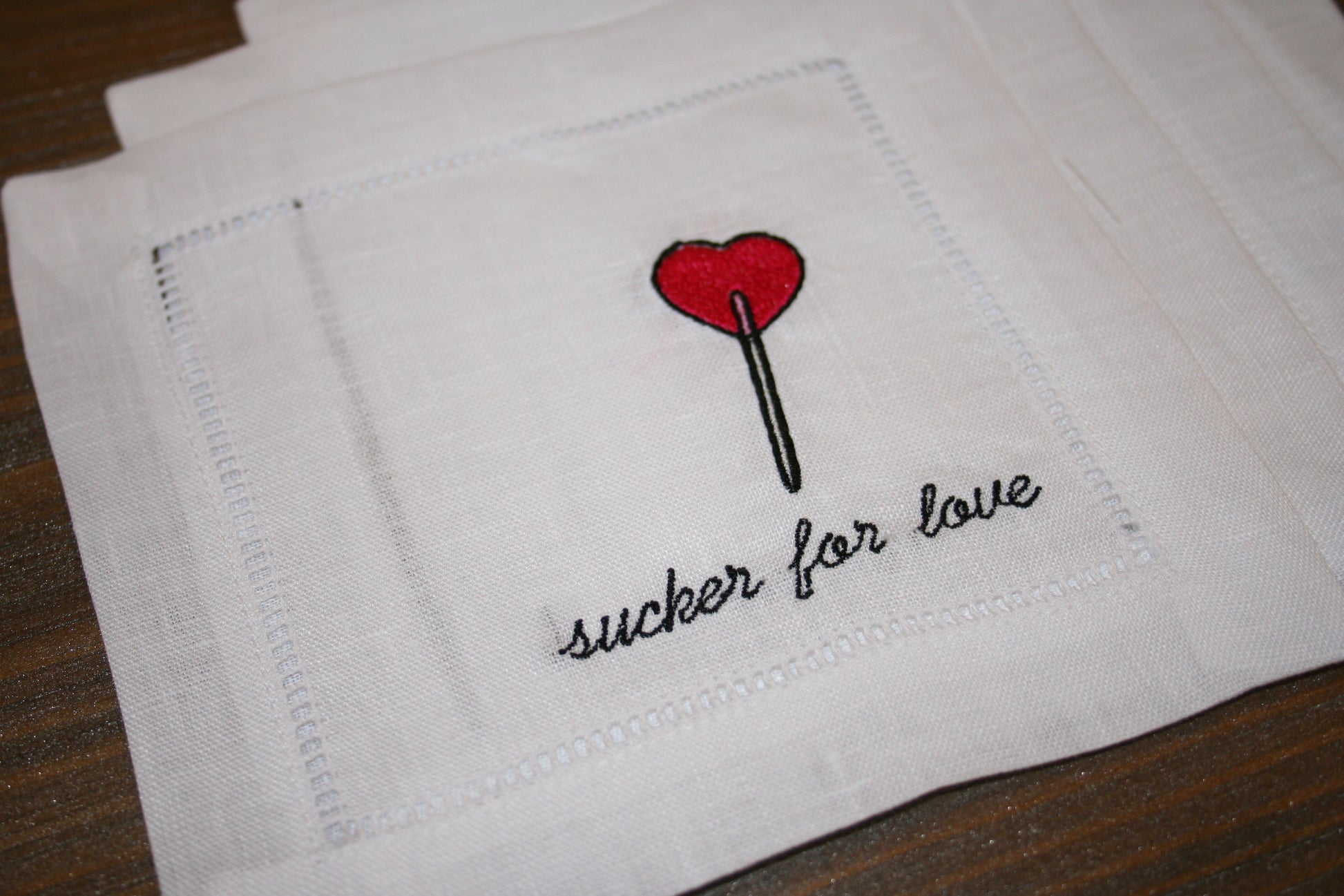 Embroidered Cocktail Napkins featuring our 'Sucker for Love' design and heart sucker