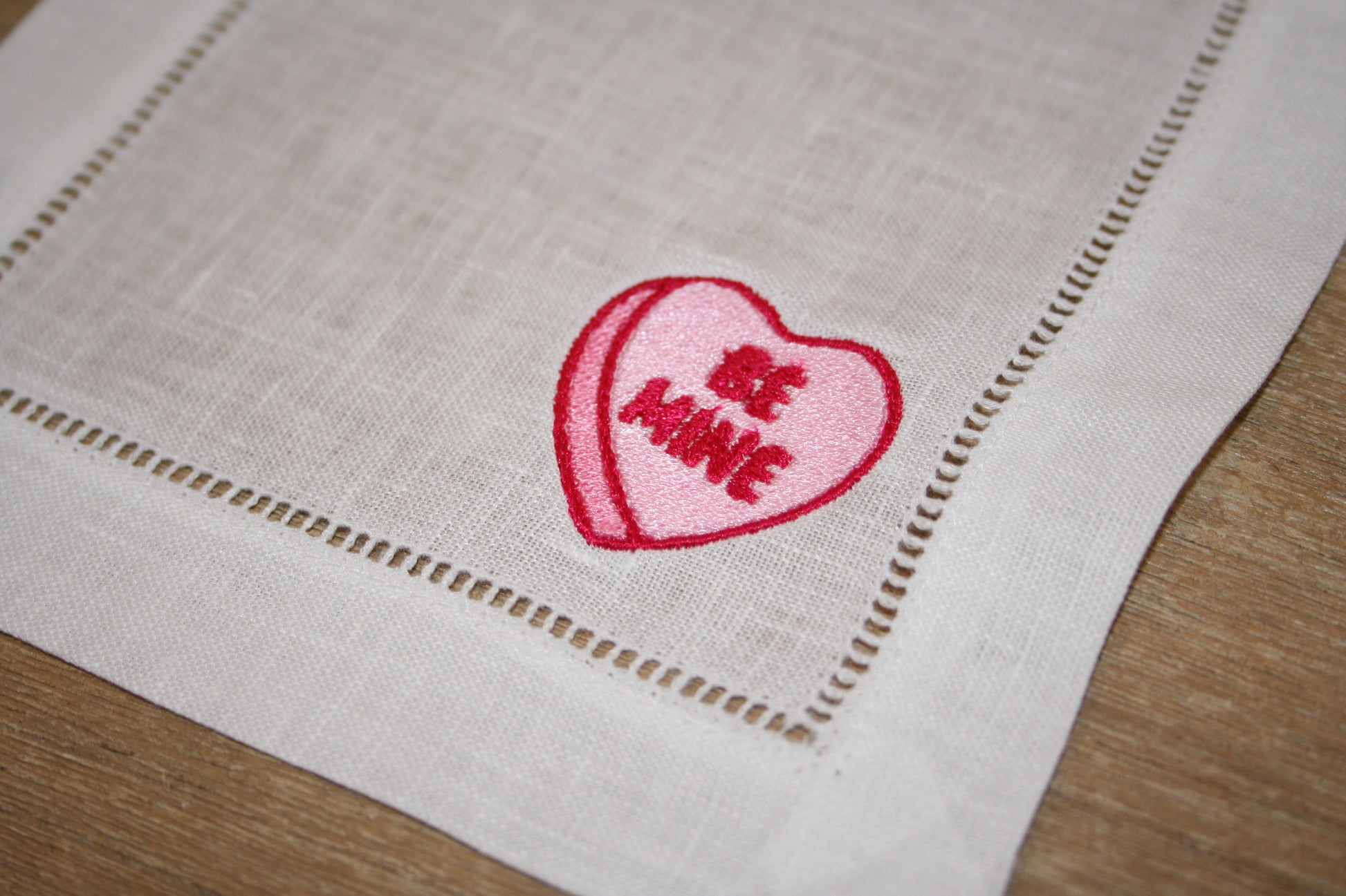 Embroidered cocktail napkins with 4 unique Valentine's Day Conversation Hearts