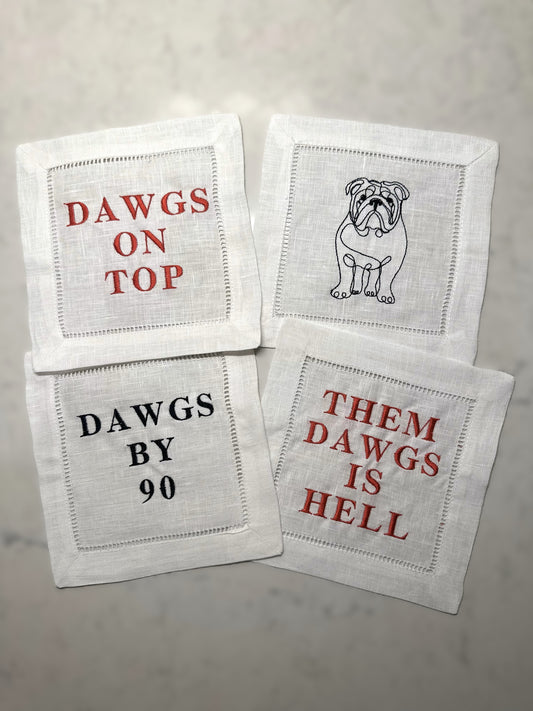 UGA Embroidered cocktail napkins with bulldog and phrases that read: Dawgs by 90, Them Dawgs is Hell, and Dawgs on top