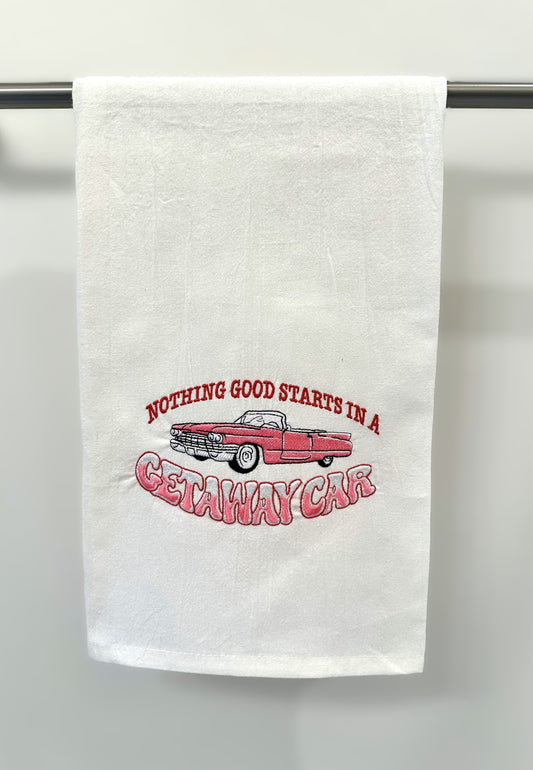 Taylor Swift inspired embroidered tea towel with lyrics 'Nothing good starts in a getaway car'